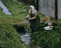 Woman Washing In Stream